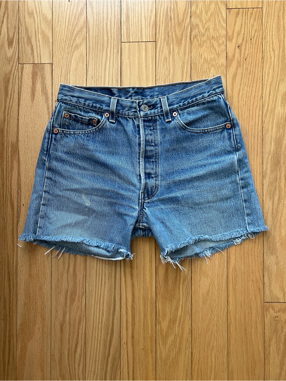 Vintage Levi's Light Blue Frayed Hem Cropped Denim Shorts
